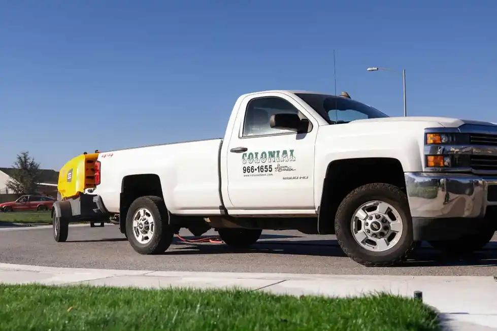 A Colonial pickup with an equipment trailer